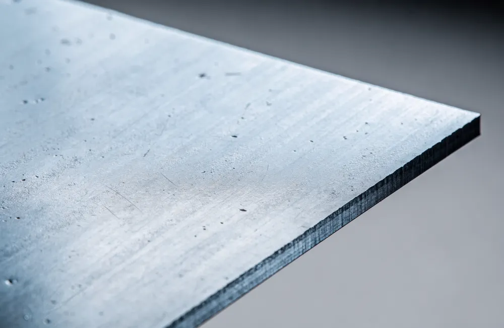 Mild steel sheet with a mill finish and a clean cut edge