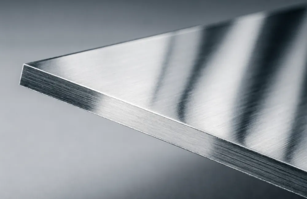 Brushed stainless steel sheet with a clean cut edge